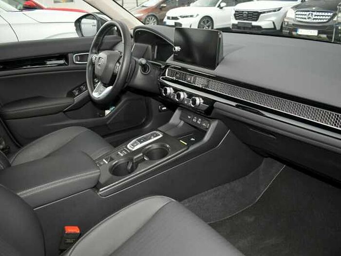 Honda Civic e: HEV Advance. .. Advance