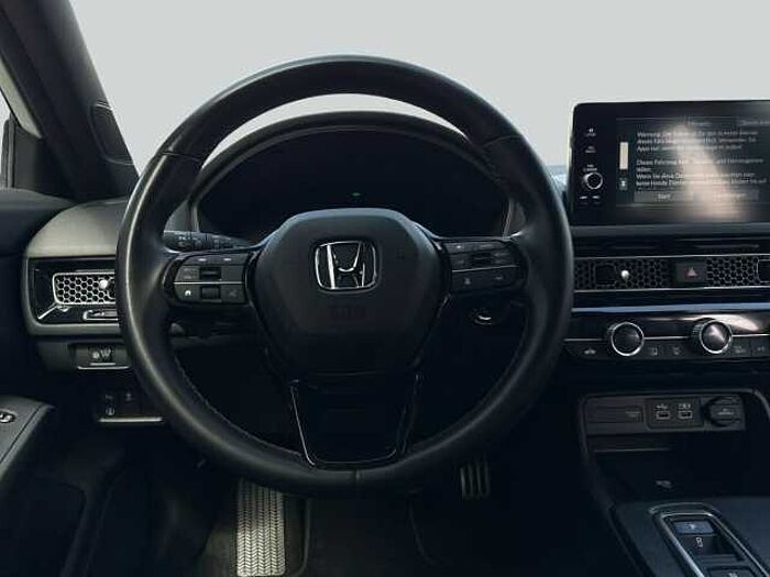 Honda Civic e: HEV Sport. .. Sport